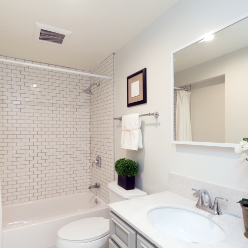 full bathroom with shower, toilette, and sink